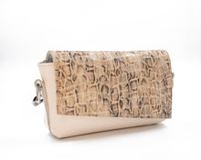 Încărcați imaginea în vizualizatorul Galeriei, Crossbody bag with snake print top section and beige bottom section on a white background