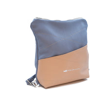 Încărcați imaginea în vizualizatorul Galeriei, Two-toned blue and beige backpack with a visible brand logo on a white background

